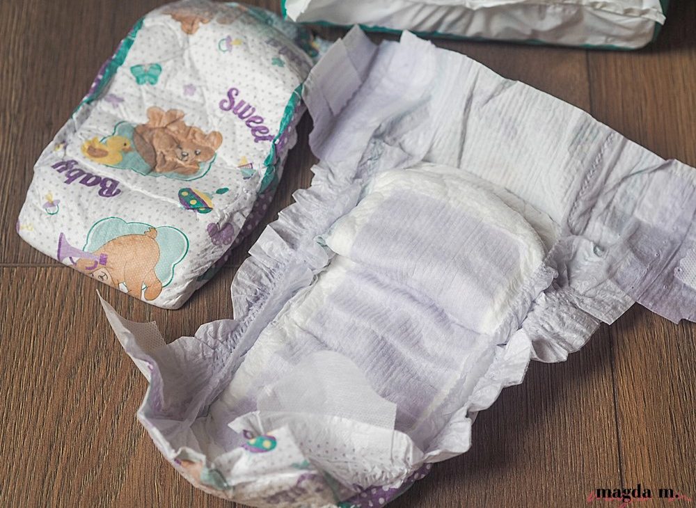 wskaż przynajmniej jedno najnowsze ulepszenie pieluszek pampers premium care